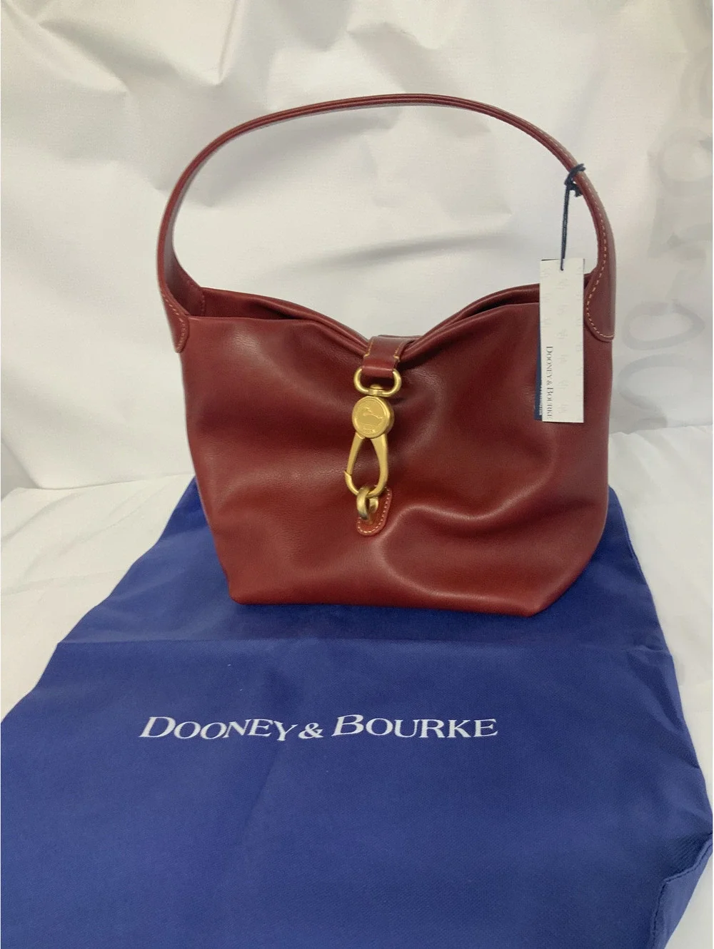DOONEY AND BOURKE FLORENTINE LEATHER LOGO LOCK HOBO-READ DESCRIPTION